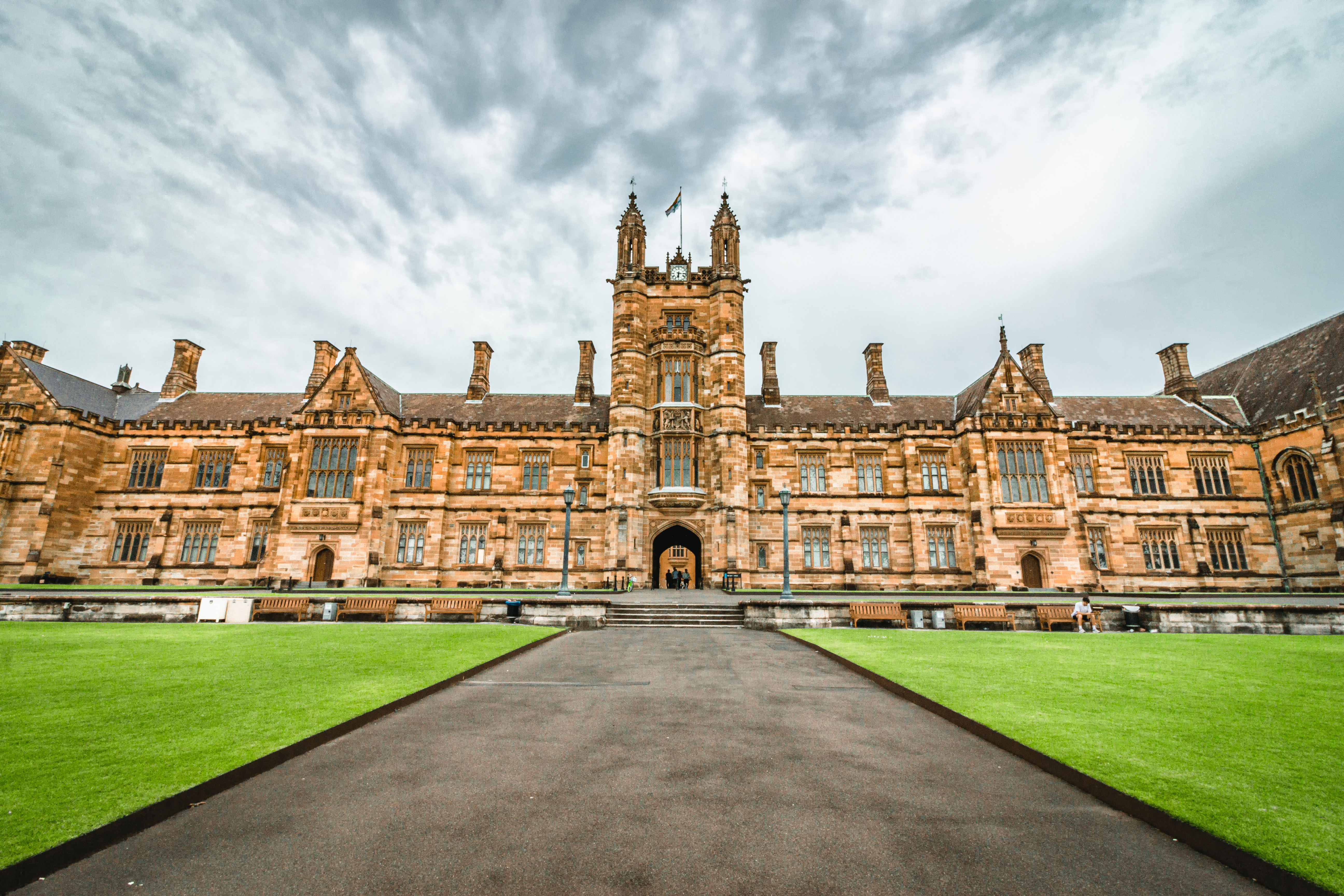 Historic university campus surrounded by green lawns